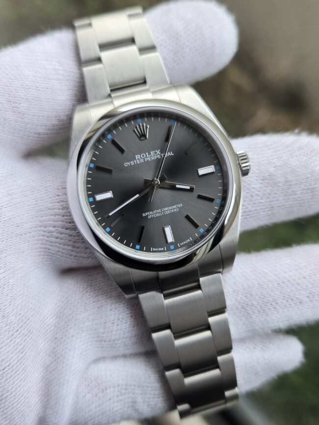Rolex Oyster Perpetual 39mm Rhodium Dial, Stainless Steel on Bracelet, Reference 114300, Year 2018, Like New Condition, Full Set with Box & Papers
