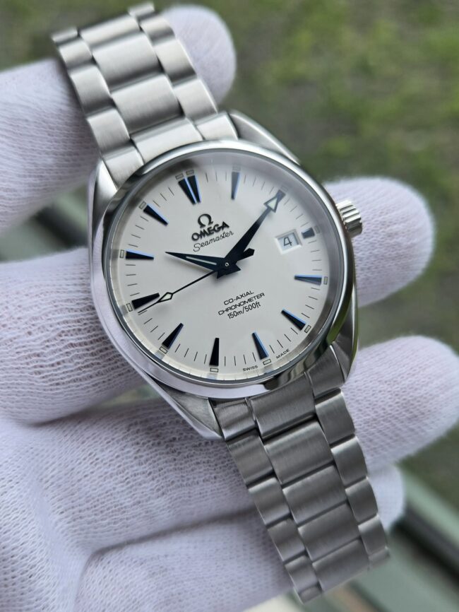 Omega Seamaster Aqua Terra 39.3mm Stainless Steel Case on Omega Bracelet, White Index Dial with Blue Indices & Hands, Reference 2503.33, Circa 2008, Serviced, with Box & Booklet.