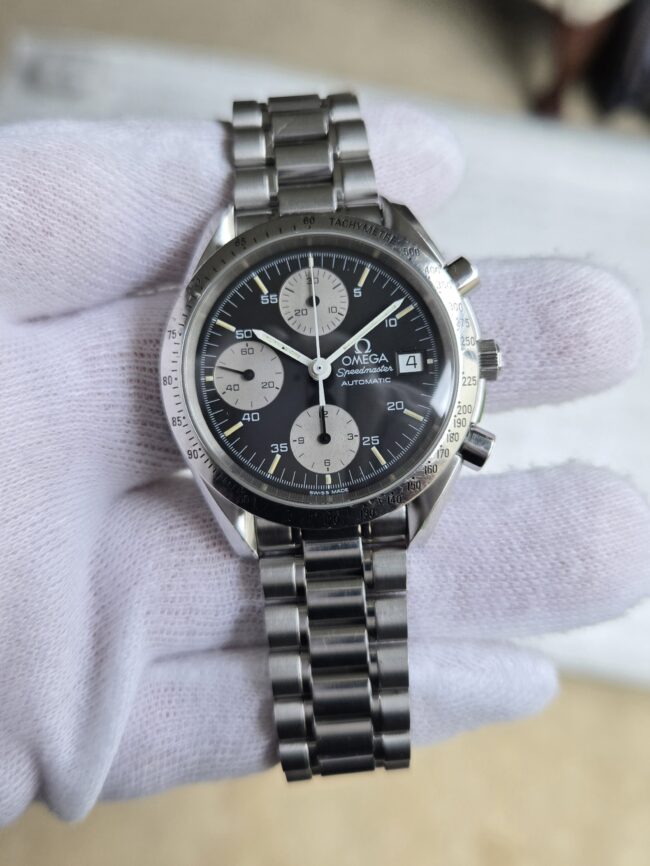 Omega Speedmaster Automatic with Date, Reverse Panda Dial, Reference 3511.50, Circa Late 90's, Excellent Condition.