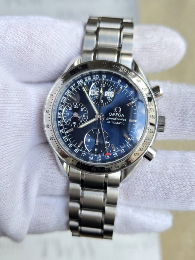Omega Speedmaster Automatic Triple Calendar Chronograph Blue Dial, Reference 3523.80, Year 2002, Just Serviced, in excellent condition, Full Set Box & Papers