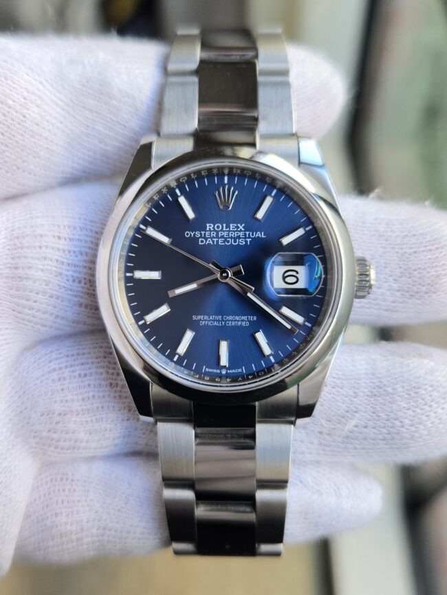 Rolex Datejust 36mm Blue Dial, Reference 126200, Year 2024, Full Set Box & Papers, Balance of the Rolex 5 Year Factory Warranty.